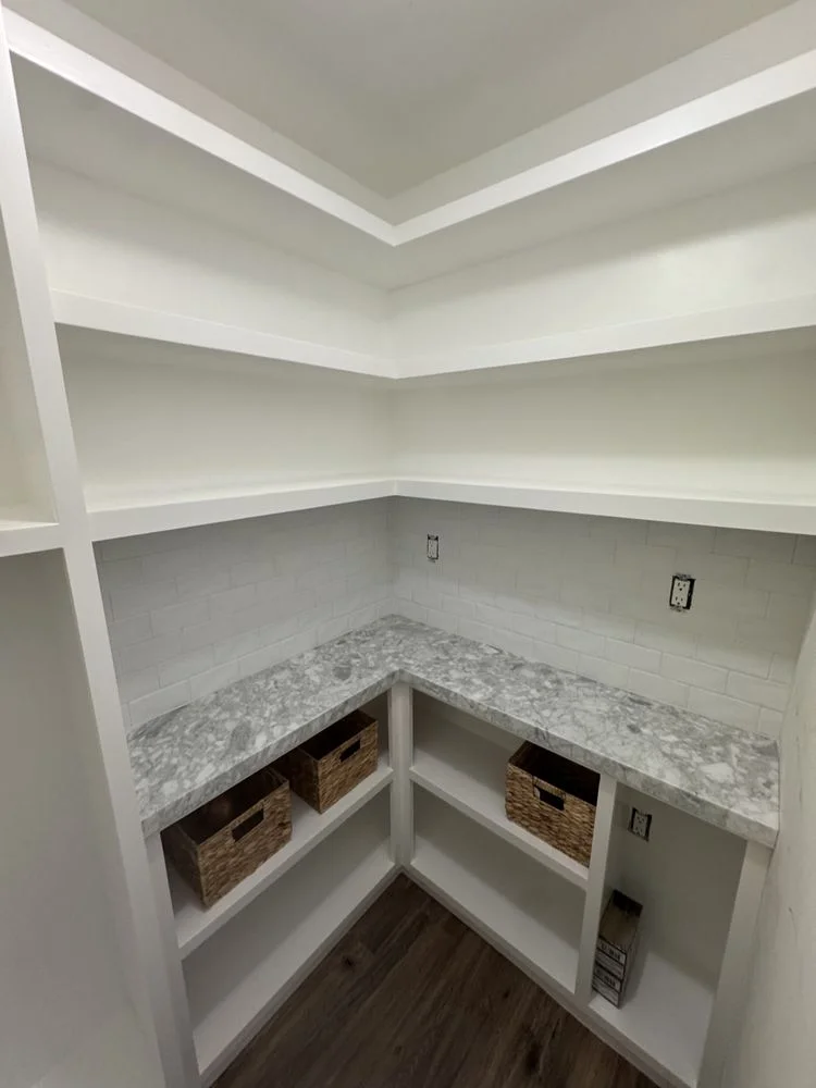 Custom walk-in pantry with paint-grade shelving and built-in cabinetry in Camarillo, CA